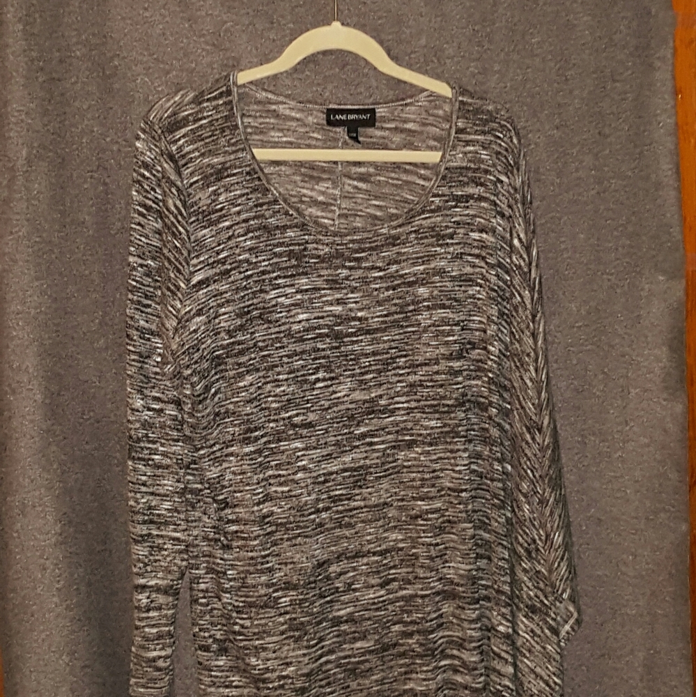 Asymmetric hem top